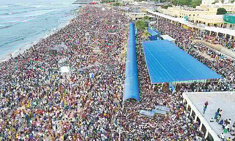 A large number of devotees throng the shore temple to witness the holy event on Monday&nbsp;