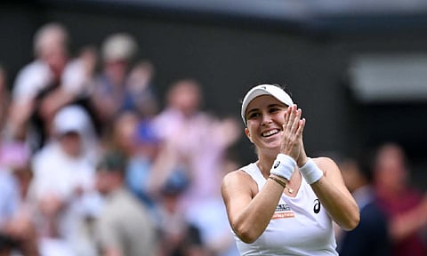 Belinda Bencic celebrates after her win