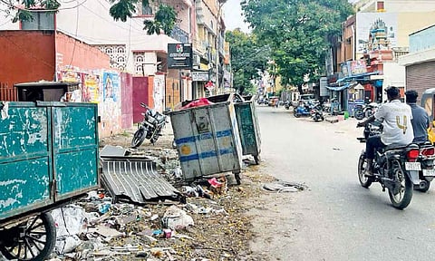 Disorderly kept garbage bins consume most of the motorable space of AP road in Choolai