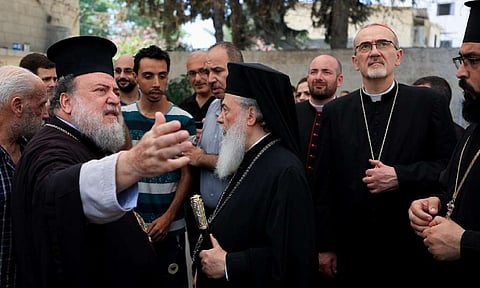 Latin Patriarch of Jerusalem Archbishop Pierbattista Pizzaballa, Greek Orthodox Patriarch of Jerusalem, Theophilos III, and Greek Orthodox Patriarchate Archbishop Alexios visit the Greek Orthodox Saint Porphyrius Church, in Gaza City&nbsp; Photo Credit: Reuters

