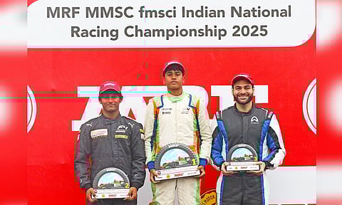 MRF F2000 Race-2 winner Ishaan Madesh (centre), flanked by second-placed Arjun Chheda (left) and third-placed Akhil Agarwal