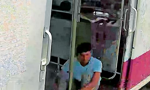 CCTV grab of the suspect on a train, released on Monday&nbsp;