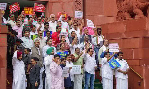 Opposition MPs stage a protest against the ongoing Special Intensive Revision (SIR) in Bihar, during the Monsoon session of Parliament (PTI)