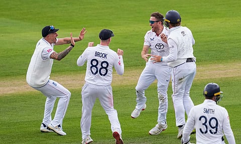 England's Liam Dawson celebrates with teammates after taking the wicket of India's Yashasvi Jaiswal on day one of the fourth test cricket match between India and England, at the Old Trafford Cricket Ground, in Manchester, Wednesday, July 23, 2025 (PTI)&nbsp;