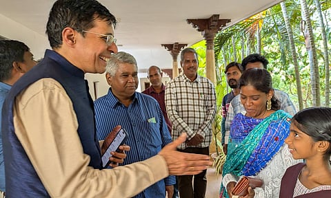 IIT-M director V Kamakoti interacting with a school student during his visit to Auroville&nbsp;