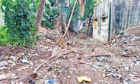 A residential building encroaching on the waterbody marked by the local body for demolition