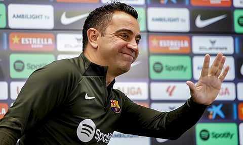 Barcelona's head coach Xavi Hernandez gestures during a press conference in Barcelona, Spain, Saturday, May 25, 2024 (AP)&nbsp;