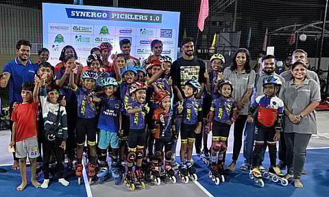 Vijay Shankar with the skating team at the venue

