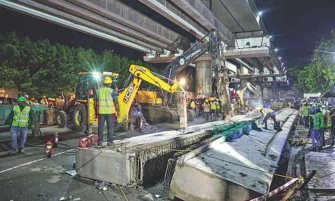Concrete girders collapsed on June 12 killing a young rider on a two-wheeler who had halted briefly under the construction site