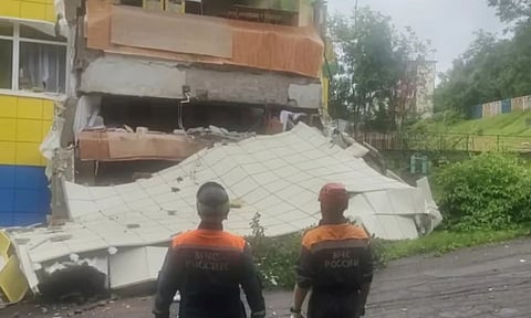 Rescuers inspect a kindergarten damaged by an earthquake in Petropavlovsk-Kamchatsky, Russia (AP)