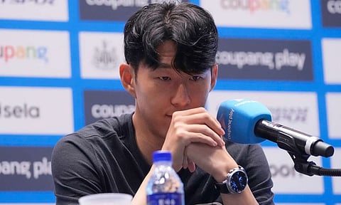 Tottenham Hotspur's Son Heung-min reacts during a press conference ahead of a preseason soccer match between Tottenham Hotspur and Newcastle United in Seoul (AP)&nbsp;
