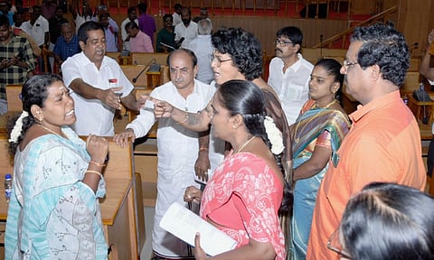 Council members involved in a heated argument during the council meeting in Thanjavur on Monday