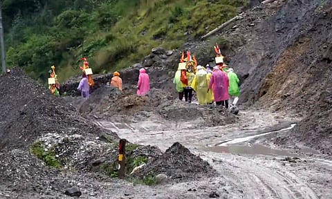 Uttarkashi: An ambulance moves on a road in flash flood-hit Dharali area, in Uttarkashi district, Uttarakhand (PTI)