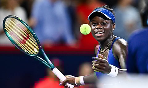 Victoria Mboko plays a shot during the match&nbsp;