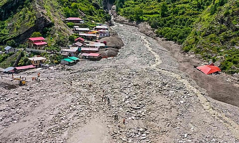 Mud and debris at an affected area following flash floods triggered by a cloudburst at Dharali, in Uttarkashi