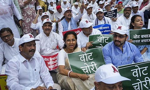 MP Supriya Sule and others during a protest march by INDIA bloc MPs from Parliament House to the Election Commission against the revision of electoral rolls in Bihar and alleged 'vote chori', in New Delhi, Monday, Aug. 11, 2025 (PTI)&nbsp;