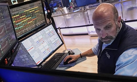 Specialist James Denaro works at his post on the floor of the New York Stock Exchange (AP)&nbsp;