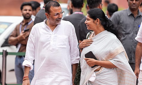 BJP MP Nishikant Dubey, left, and DMK MP Kanimozhi Karunanidhi during the Monsoon session of Parliament in New Delhi (PTI)