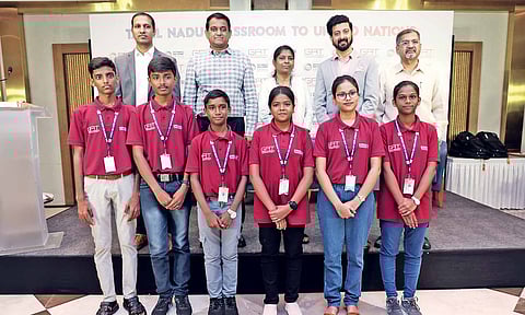 School Education Secretary Chandra Mohan (second from left) with students from different government schools across TN&nbsp;