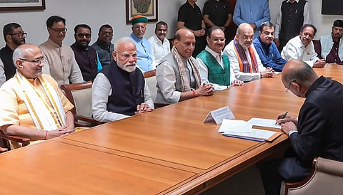 Prime Minister Narendra Modi flanked by Maharashtra Governor and NDA's candidate CP Radhakrishnan as the latter files the nomination papers for vice presidential elections, in New Delhi. Defence Minister Rajnath Singh also seen (PTI)&nbsp;&nbsp;
