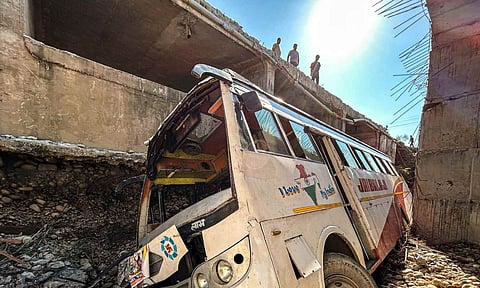 Wrecked remains of a bus carrying pilgrims to the cave shrine of Mata Vaishno Devi, after it skidded off the Jammu-Pathankot highway and fell into a gorge, in Kathua, Thursday, Aug. 21, 2025 (PTI)&nbsp;