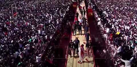 Crowd climb ramp to shake hands with Vijay (Credits: X)