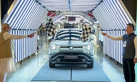 Prime Minister Narendra Modi flags off Maruti Suzuki's first electric vehicle e-Vitara from Hansalpur manufacturing facility (PTI)