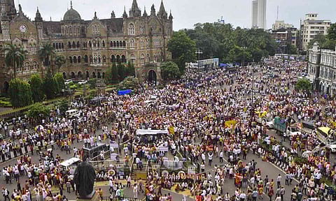 Supporters of activist Manoj Jarange Patil on their way to Mumbai's Azad Maidan to participate in his Maratha reservation protest, at Vashi Toll Plaza, in Navi Mumbai, Friday, Aug. 29, 2025 (PTI)&nbsp;
