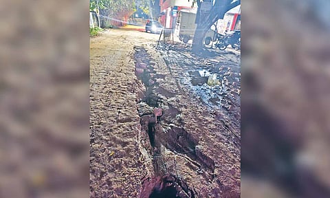 Uneven and slushy 100-metre stretch of Shree Aishwarya Prapancha Road