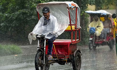 A man drives an electric rickshaw amid monsoon rain, in New Delhi, Friday, Aug. 29, 2025 (PTI)&nbsp;