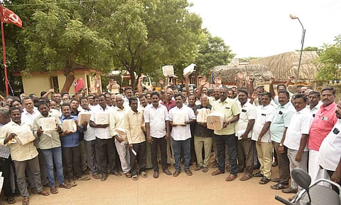 Tasmac employees staging a protest in Thanjavur on Monday&nbsp;