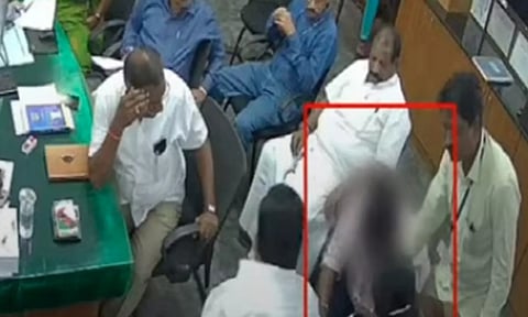 Video of municipal employee falling at DMK councillor's feet goes viral (Photo/Maalaimalar)