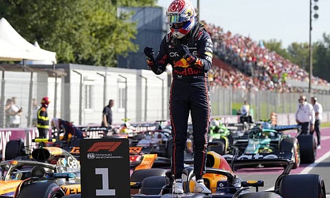 Defending world champion Max Verstappen celebrates after securing pole position for the Italian Grand Prix at Monza (AP)