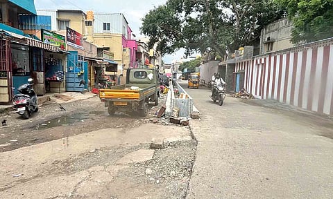 Vehicles parked on the 40-foot road in Kolathur&nbsp;