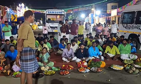 In protest against the chariot not being diverted to their area, members of the Dalit community sat on the road, blocking the path with their offering plates.