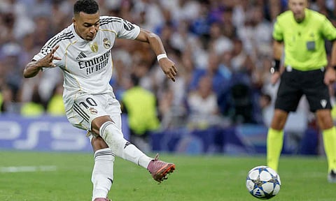 Kylian Mbappe takes a shot from the penalty spot&nbsp;&nbsp;