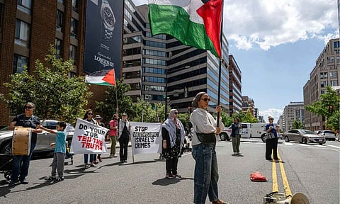 Pro-Palestinian demonstrators gather for a protest in front of the Associated Press offices, Thursday, Aug. 28, 2025, in Washington. (AP Photo)