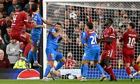 Virgil van Dijk leaps to score Liverpool's winning goal&nbsp;