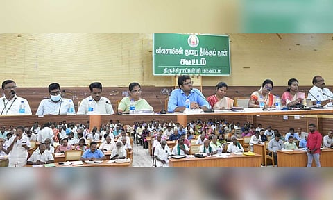 District Collector V Saravanan addressing the farmers during the grievances redressal meet on Friday&nbsp;