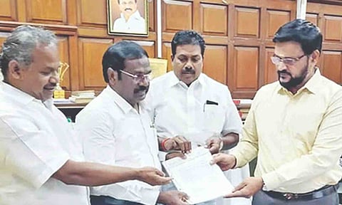 PMK legislators supporting Anbumani, and advocate Balu submitting petition to Assembly secretary on Thursday
