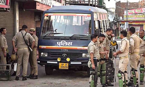 Police personnel keep a vigil amid tight security after recent clashes, in Bareilly (PTI)&nbsp;