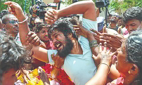 Relatives of the victims mourn in front of Karur Government Medical College hospital, following the stampede at an election campaign rally addressed by TVK leader Vijay