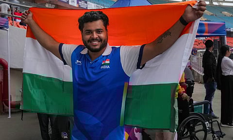 India's Yogesh Kathuniya poses for a photograph as he wins silver in men's discus F56 event during the World Para Athletics Championships 2025, at Jawaharlal Nehru Stadium, in New Delhi (PTI)