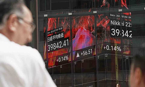 World shares are mixed after upbeat economic updates (AP)&nbsp;