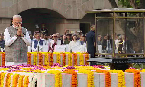 Prime Minister Narendra Modi pays homage to Mahatma Gandhi on his birth anniversary, at Rajghat in New Delhi, Thursday, Oct. 2, 2025 (PTI)&nbsp;