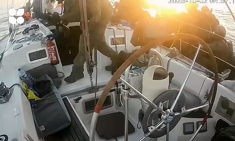 This frame grab from video released by the Global Sumud Flotilla shows as Israeli Navy soldiers board one of the flotilla vessels as they approach of the coast of Gaza early Thursday, Oct 2, 2025(Photo | via AP)
