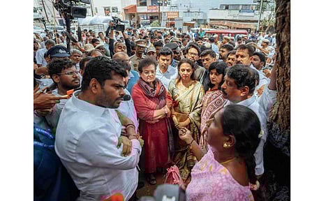 A BJP delegation led by MP and actor Hema Malini interacts with officials during a visit to inspect the TVK rally stampede spot, in Karur district, Tamil Nadu, Tuesday, Sept. 30, 2025 (PTI)&nbsp;