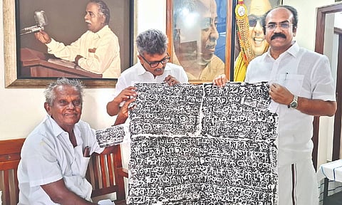 Epigraphist Karu Rajendran hands over copies of inscriptions to minister Thangam Thennarasu
