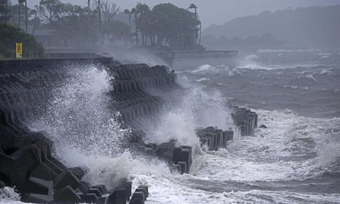 High waves hit a coastal area in Ibusuki, Kagoshima prefecture, western Japan as a typhoon is approaching (AP)