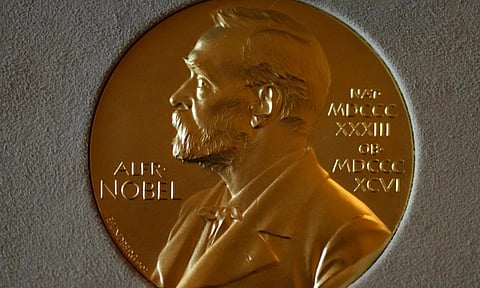 A Nobel Prize medal is displayed before a ceremony at the Swedish Ambassador's Residence in Londor (AP)